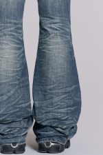 Mid Blue Distressed Creased Drift Flared Jeans - Image 5